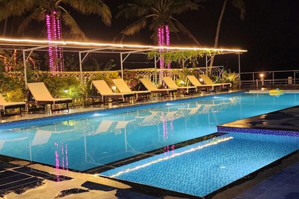 Swimming pool and outdoor leisure area at Skylar Seaview Resort.
