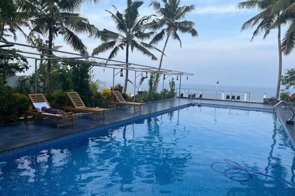 Scenic sunset view of Varkala Cliff and the Arabian Sea near Skylar Seaview Resort.